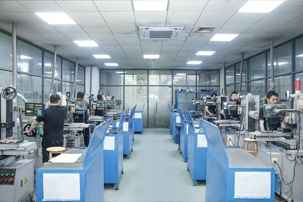 Precision grinding machine processing at XUXIANG facility