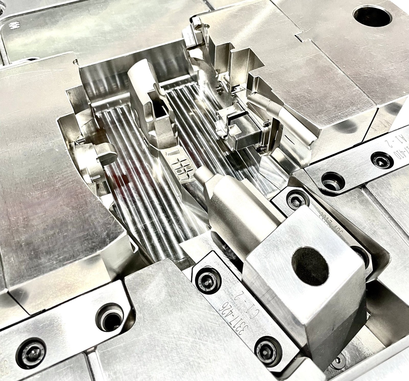 Precision machined mold insert for plastic injection tooling