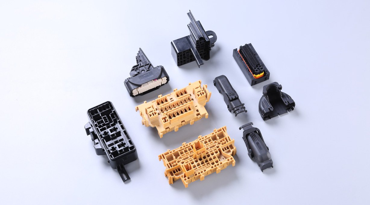 Precision mold components for automotive connectors