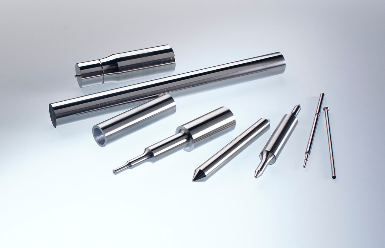 Precision-ground metal component with tight tolerances
